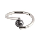A white gold open wrap ring featuring a faceted grey diamond, shown on a plain white background.