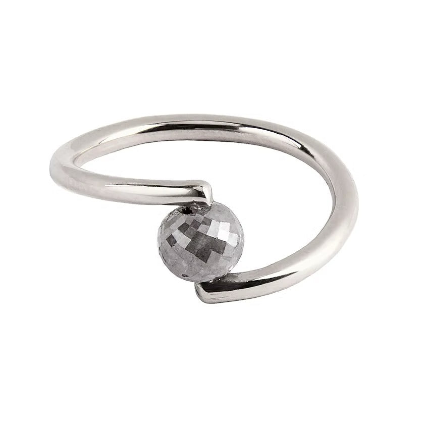 A white gold open wrap ring featuring a faceted grey diamond, shown on a plain white background.