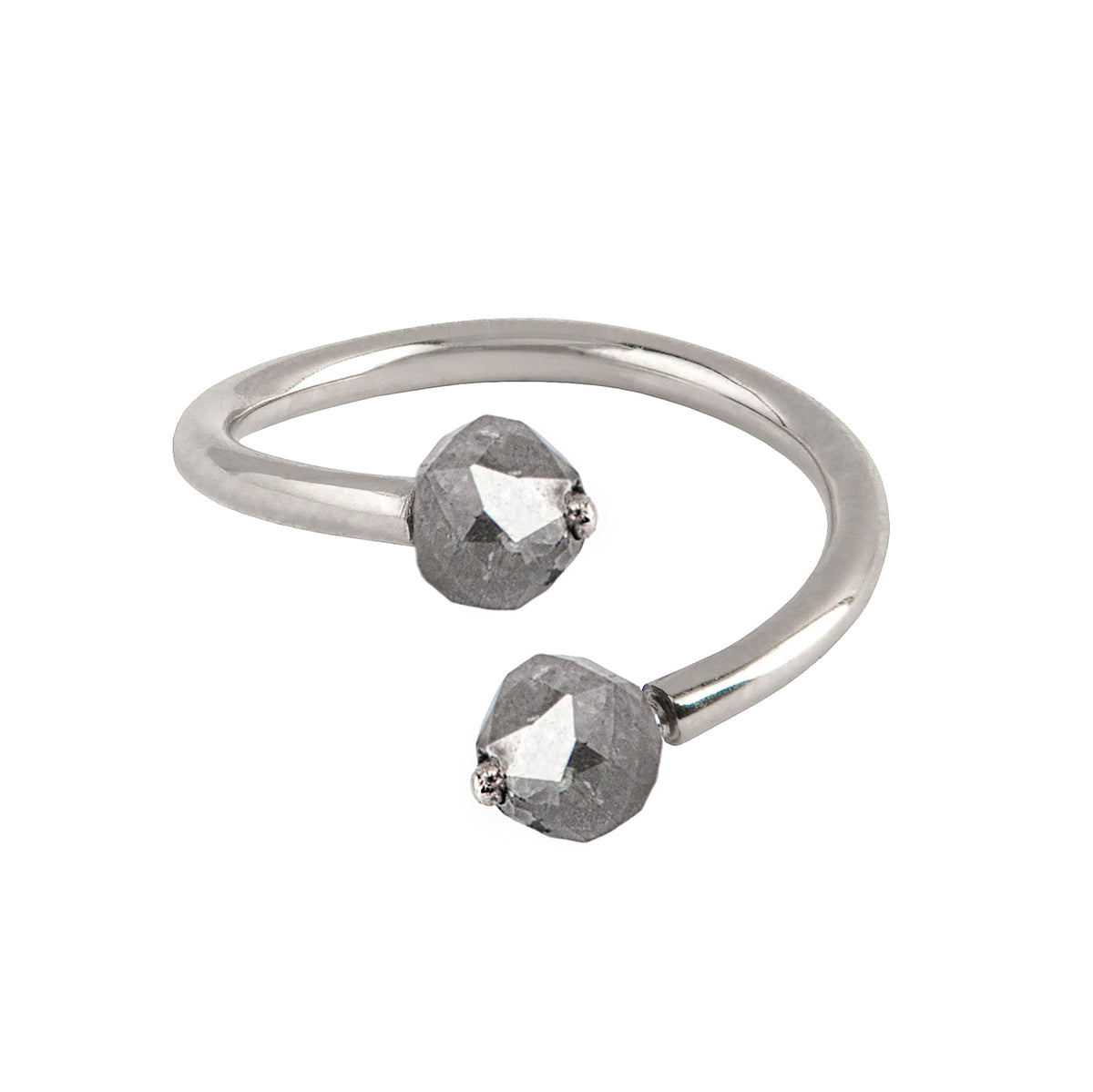 A gold open cuff ring featuring two faceted gray diamonds, photographed on a clean white background.