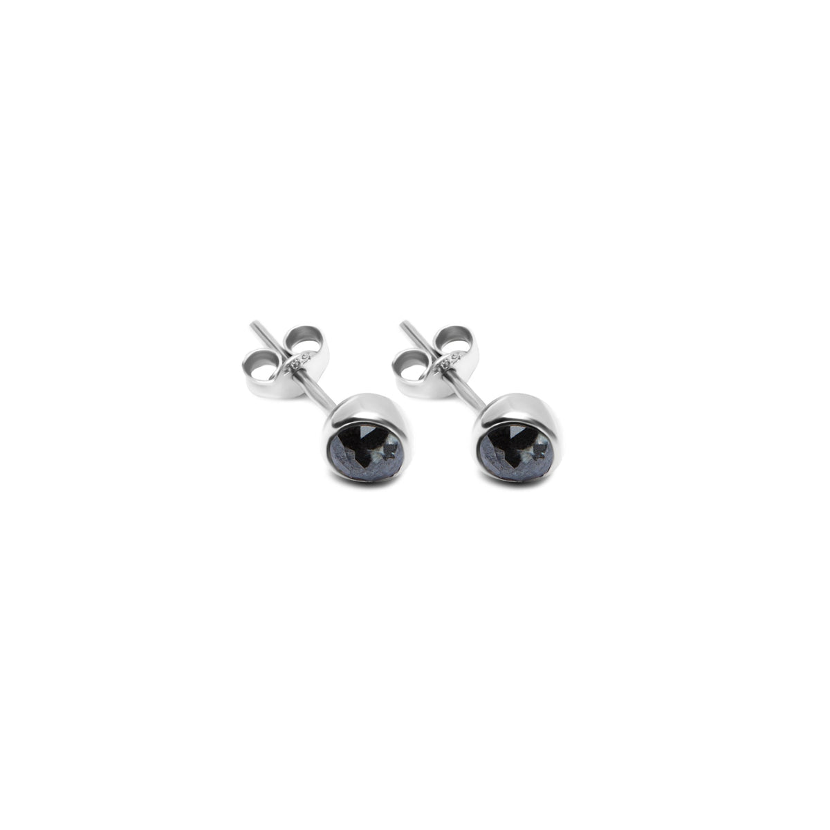 A pair of gold stud earrings with round black diamonds centers, shown on a plain white background.