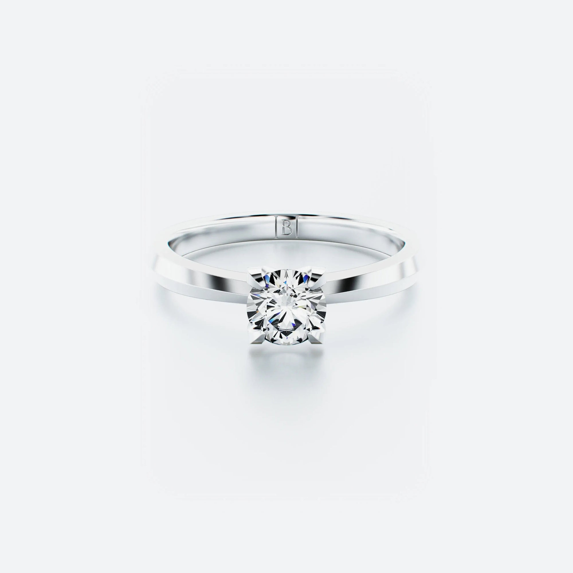Single stone diamond ring featuring a brilliant-cut diamond elegantly set on a polished band, with a total carat weight of 0.50 ct.