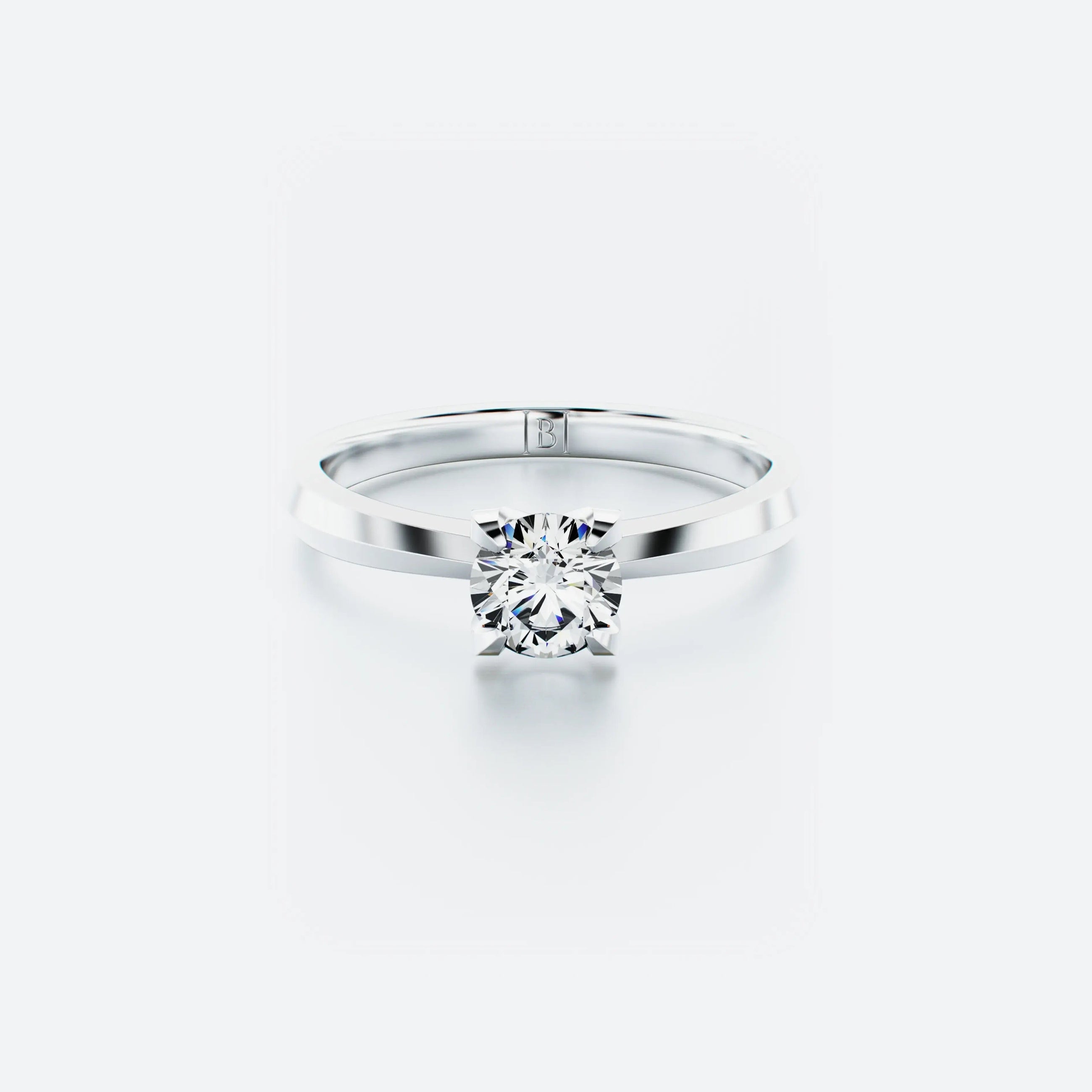 Single stone diamond ring featuring a brilliant-cut diamond elegantly set on a polished band, with a total carat weight of 0.50 ct.