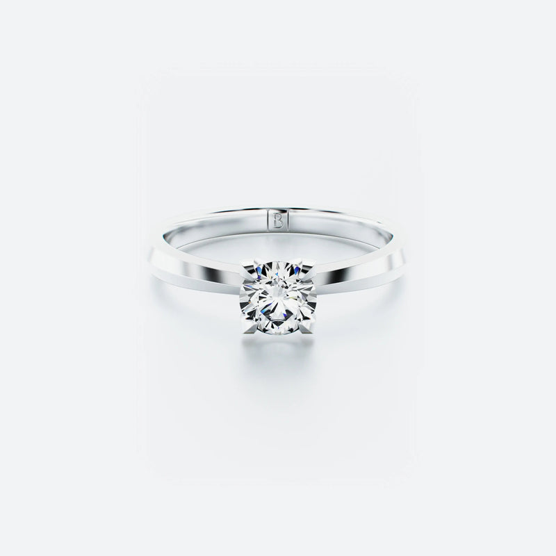 Single stone diamond ring featuring a brilliant-cut diamond elegantly set on a polished band, with a total carat weight of 0.50 ct.