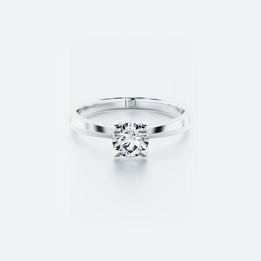 Single stone diamond ring featuring a brilliant-cut diamond elegantly set on a polished band, with a total carat weight of 0.50 ct.