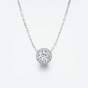 Halo Diamond Pendant featuring a central diamond surrounded by a sparkling halo, with a total carat weight of 0.40 ct.
