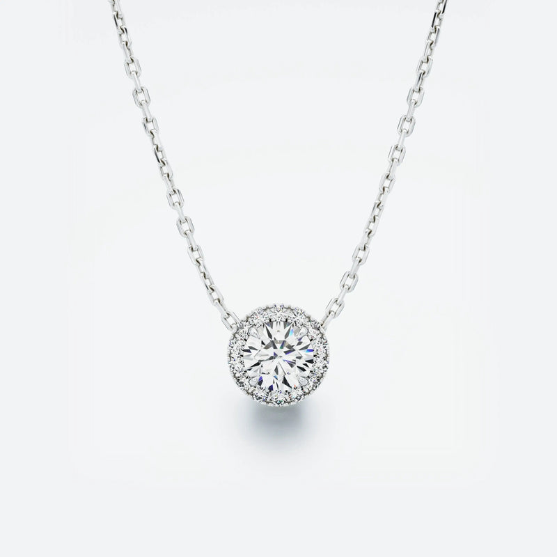 Halo Diamond Pendant featuring a central diamond surrounded by a sparkling halo, with a total carat weight of 0.40 ct.