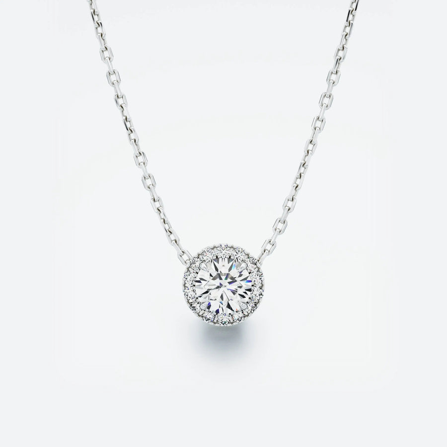 Halo Diamond Pendant featuring a central diamond surrounded by a sparkling halo, with a total carat weight of 0.40 ct.