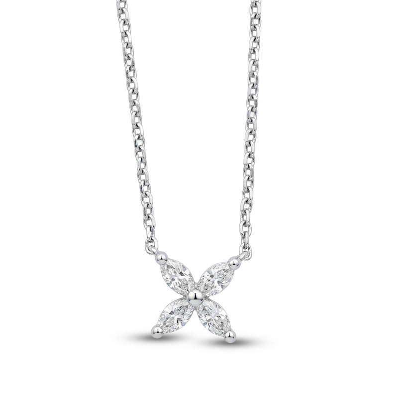 Delicate flower pendant crafted in 14k white gold, adorned with marquise-cut diamonds.