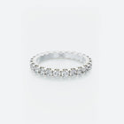 Diamond Eternity Band featuring a continuous row of brilliant round diamonds encircling the entire band, with a total carat weight of 1.40 ct.