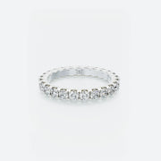 Diamond Eternity Band featuring a continuous row of brilliant round diamonds encircling the entire band, with a total carat weight of 1.40 ct.