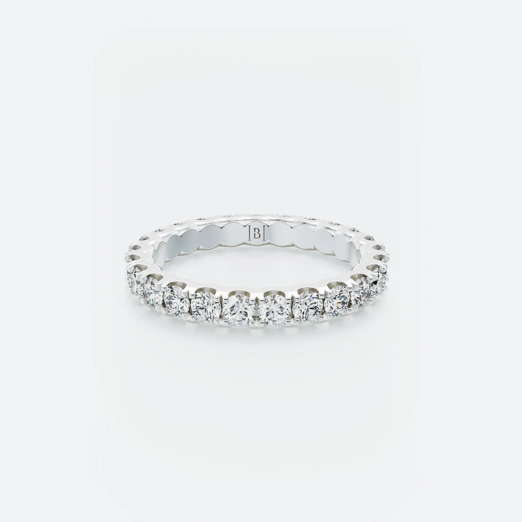 Diamond Eternity Band featuring a continuous row of brilliant round diamonds encircling the entire band, with a total carat weight of 1.40 ct.