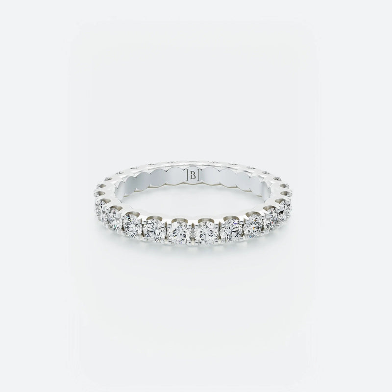 Diamond Eternity Band featuring a continuous row of brilliant round diamonds encircling the entire band, with a total carat weight of 1.40 ct.