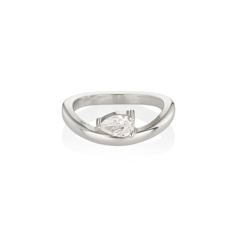 white gold engagement ring with pear-shaped diamond