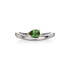 White gold ring featuring a pear-cut tourmaline in a prong setting, shown on a clean white background with a soft reflection.