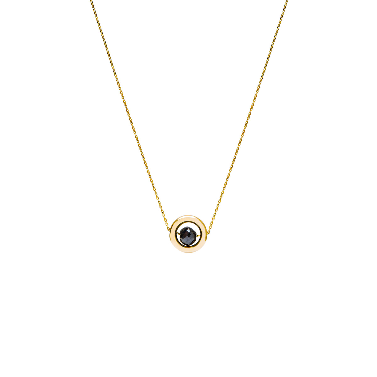 A delicate gold chain necklace featuring a small circular pendant with a gold outer ring and a dark, nearly black, faceted diamond, shown against a plain white background.