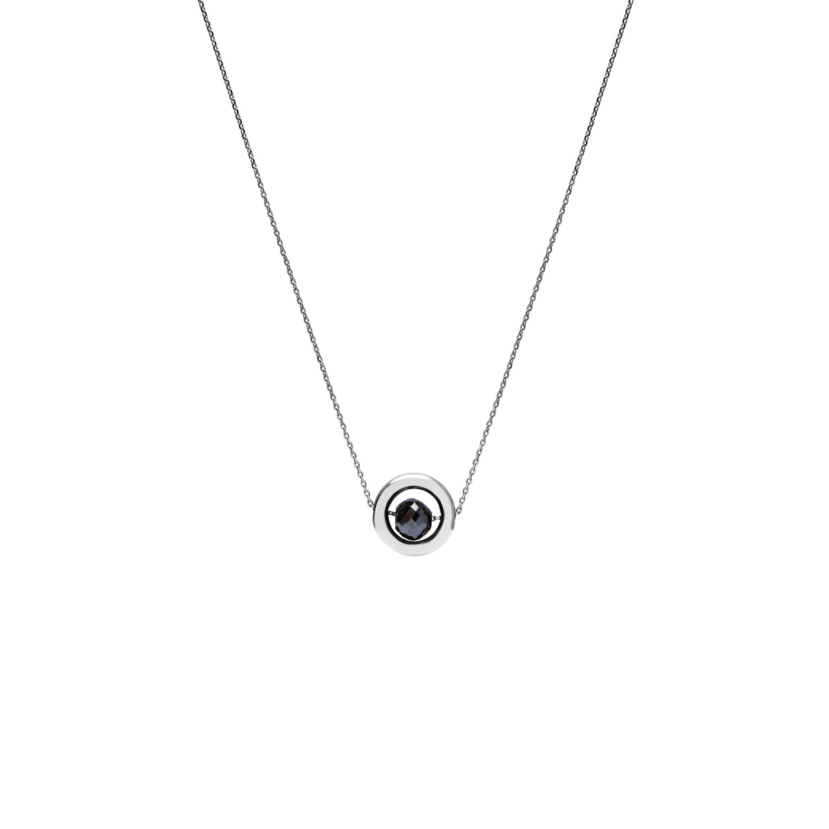 A delicate white gold chain necklace featuring a small circular pendant with a gold outer ring and a dark, nearly black, faceted diamond, shown against a plain white background.