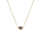 A delicate gold chain necklace featuring a small, polished gold crescent-shaped setting holding a round, dark gray diamond, presented on a solid white background.