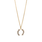 Yellow gold necklace with a faceted grey diamonds pendant on a white background.