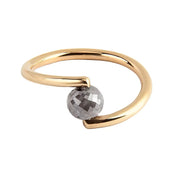 A yellow gold open wrap ring featuring a faceted grey diamond, shown on a plain white background.