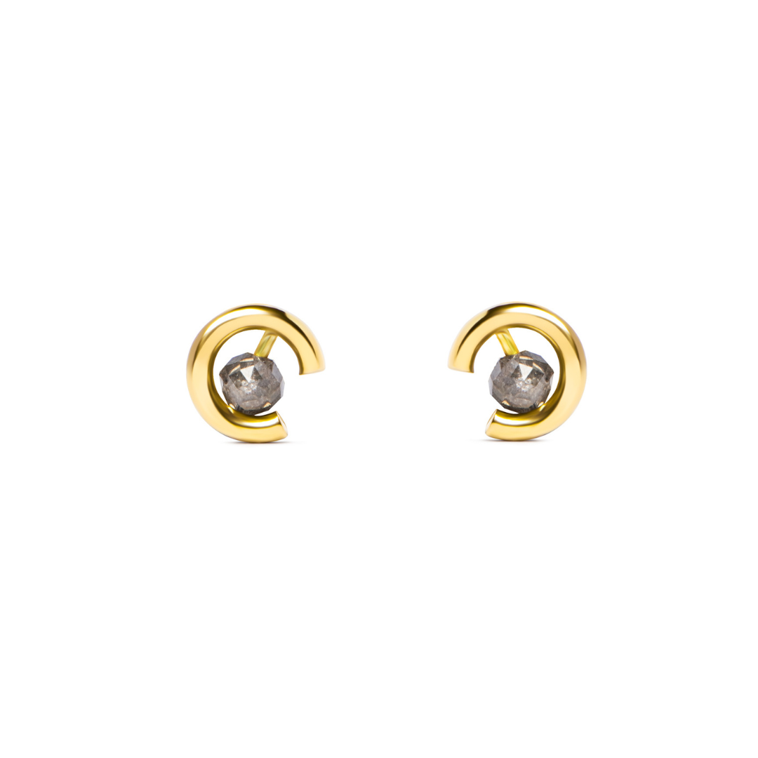 A pair of gold crescent-shaped stud earrings with round grey diamonds, shown on a plain white background.