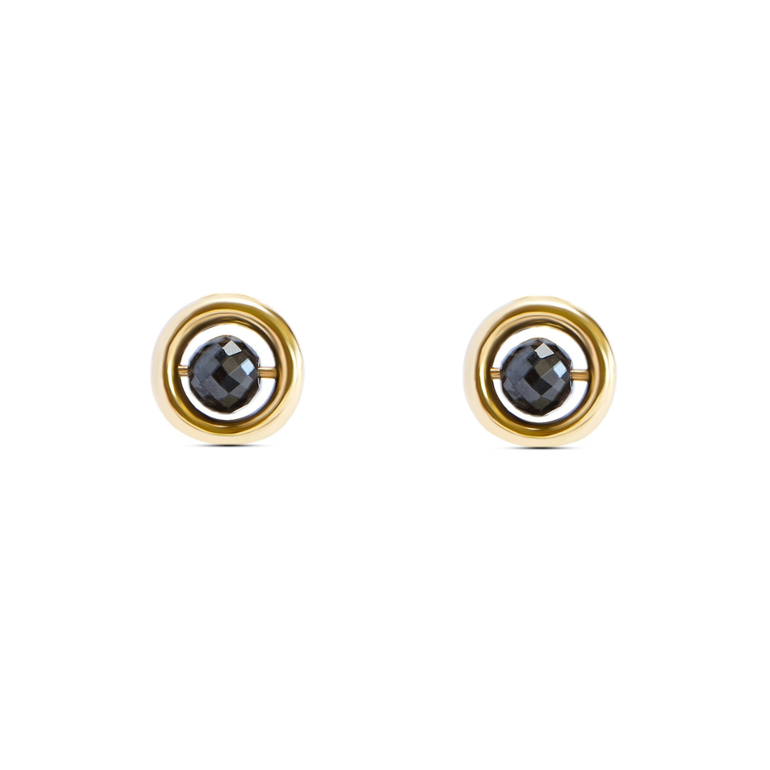 A pair of yellow gold stud earrings with a central faceted black diamond, set against a plain white background.