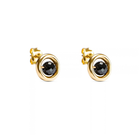 A pair of yellow gold stud earrings with a central faceted black diamond, set against a plain white background.