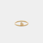 Yellow gold ring with a heart-shaped detail.