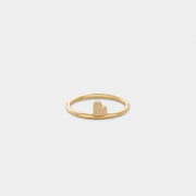 Yellow gold ring with a heart-shaped detail.