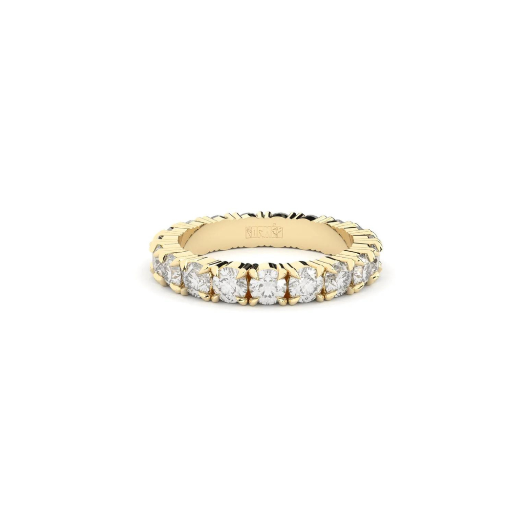 A yellow gold ring featuring a band of inset premium laboratory made diamonds, with a total weight of approximately 2.65 carats.