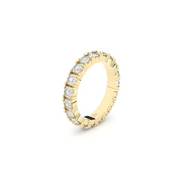 A yellow gold ring featuring a band of inset premium laboratory made diamonds, with a total weight of approximately 2.65 carats.