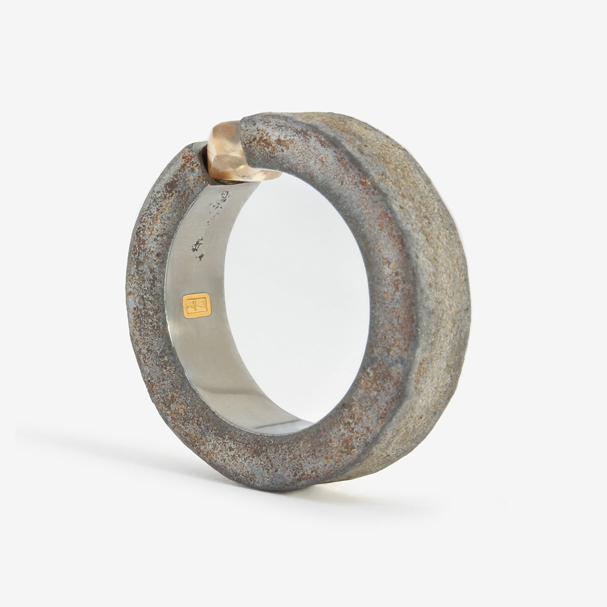 One-of-a-kind ring composed of hafnium and rough diamond by ASR JWLS.