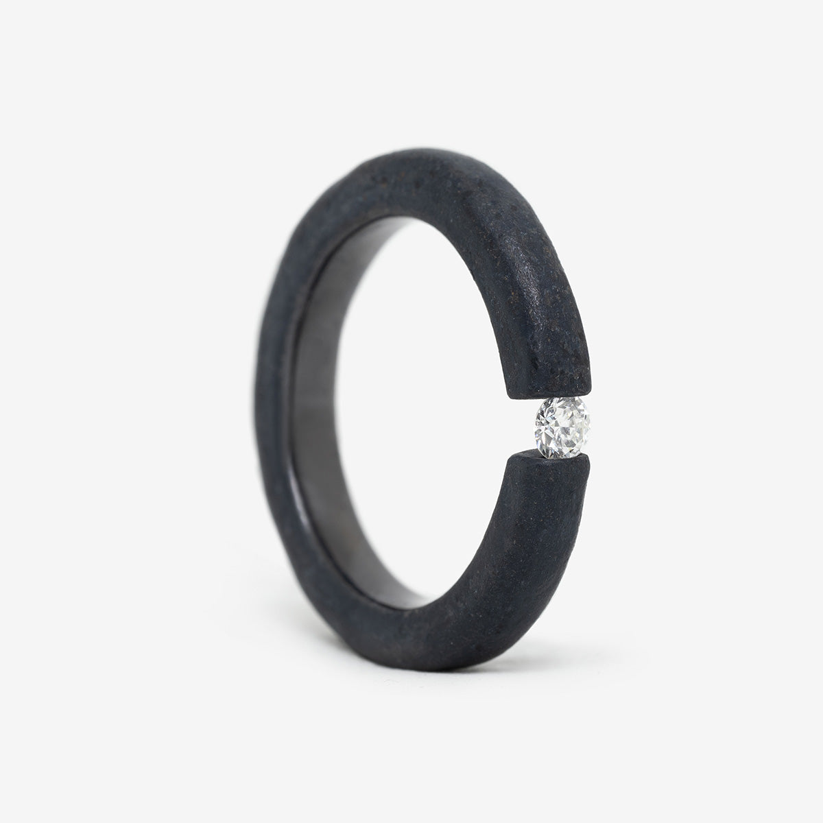 One-of-a-kind ring composed of niobium and a white diamond by ASR JWLS.