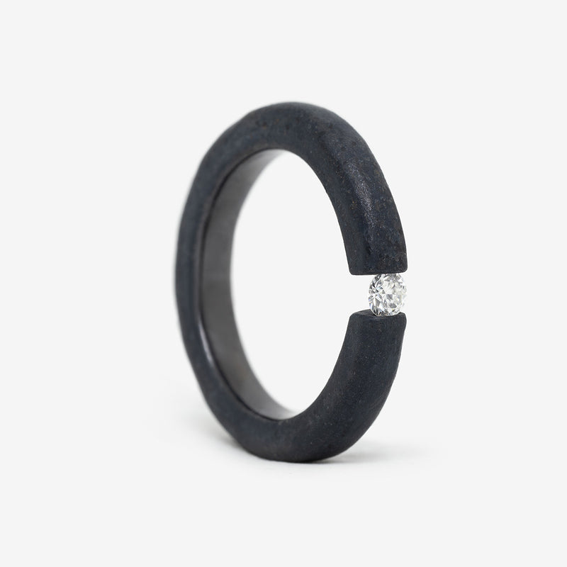 One-of-a-kind ring composed of niobium and a white diamond by ASR JWLS.