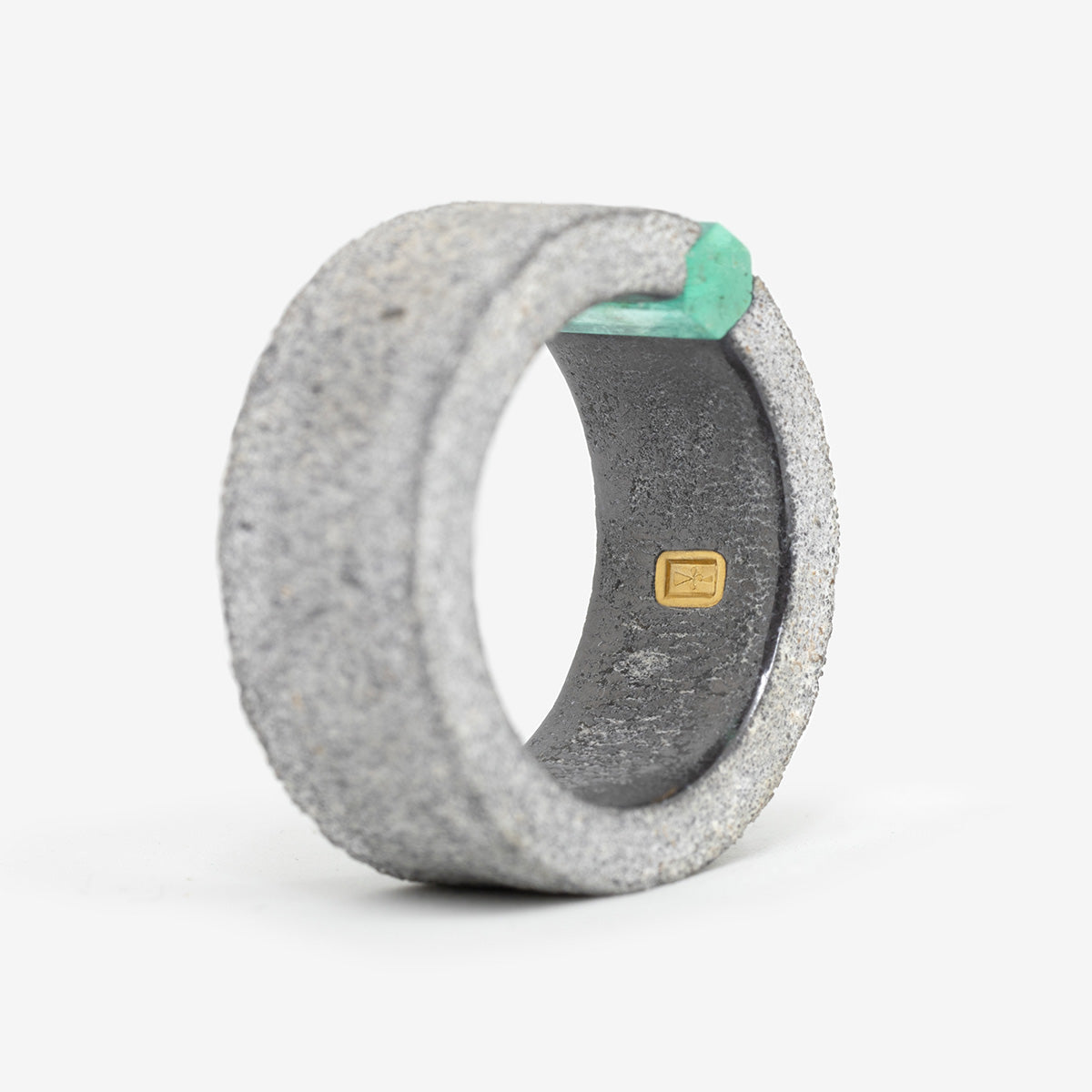 One-of-a-kind ring composed of tantalum and rough Columbian emerald by ASR JWLS.