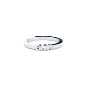 A solid white gold ring with the finest quality laboratory made diamond, featuring the inscription 'BOY' on it.