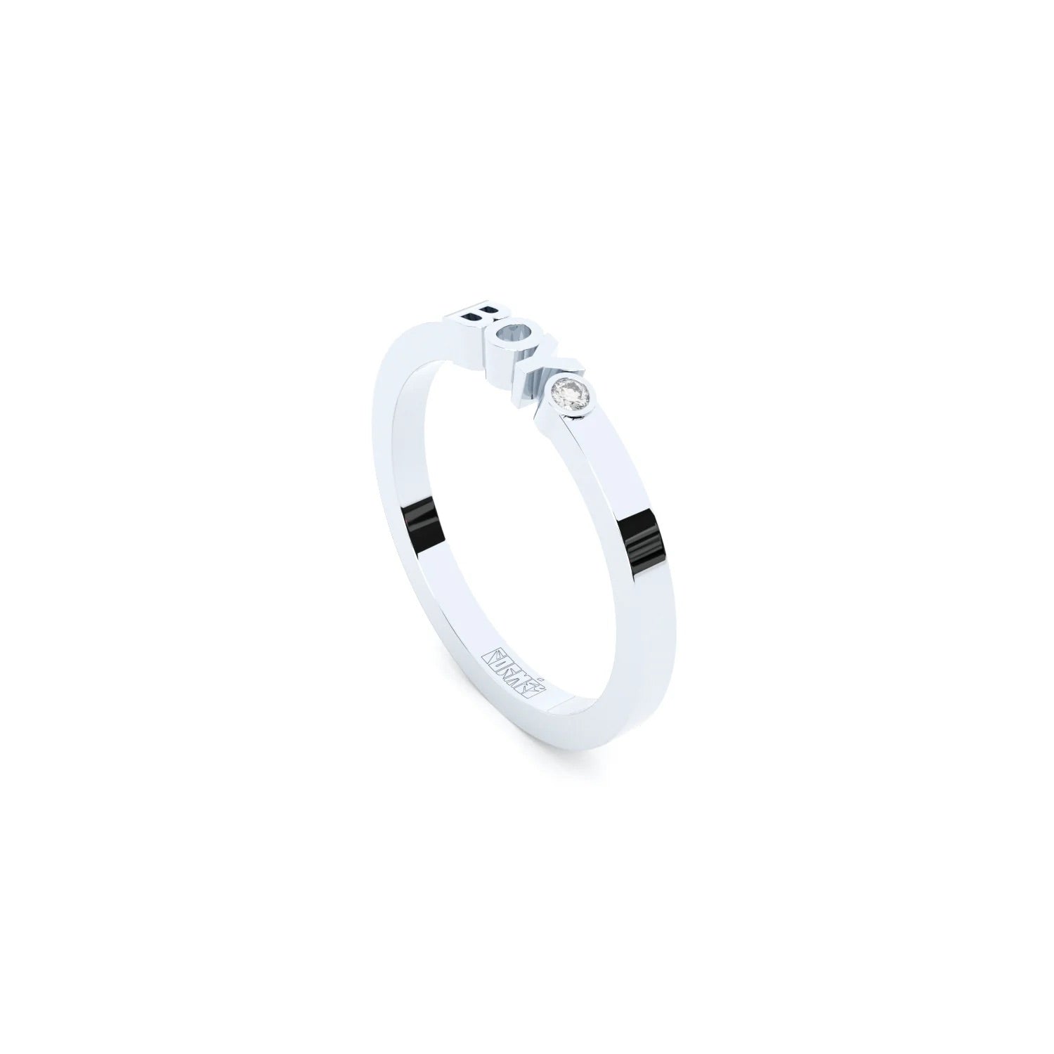 A solid white gold ring with the finest quality laboratory made diamond, featuring the inscription 'BOY' on it.