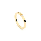 A solid yellow gold ring with the finest quality laboratory made diamond, featuring the inscription 'BOY' on it.