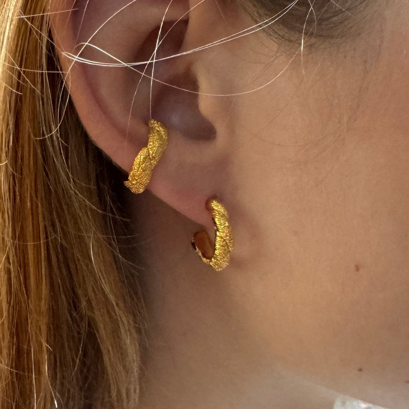 Gold-plated silver earrings inspired by coral shapes.
