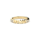 Yellow gold and diamonds ring with 'MAMA' engraving on a white background