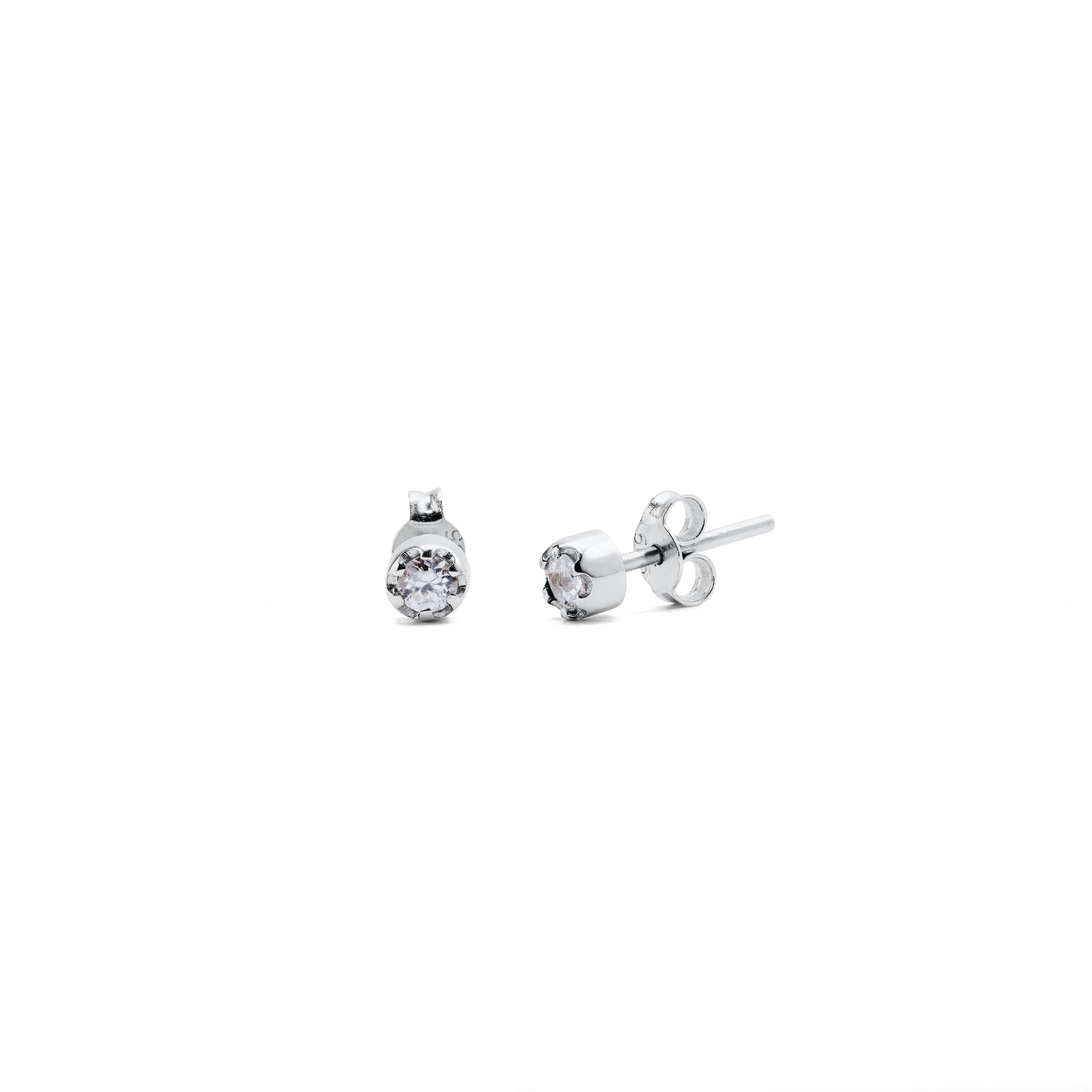 Stud earrings featuring round brilliant-cut diamonds set in 14k white gold.