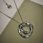Silver Necklace "Circulating Meaning"