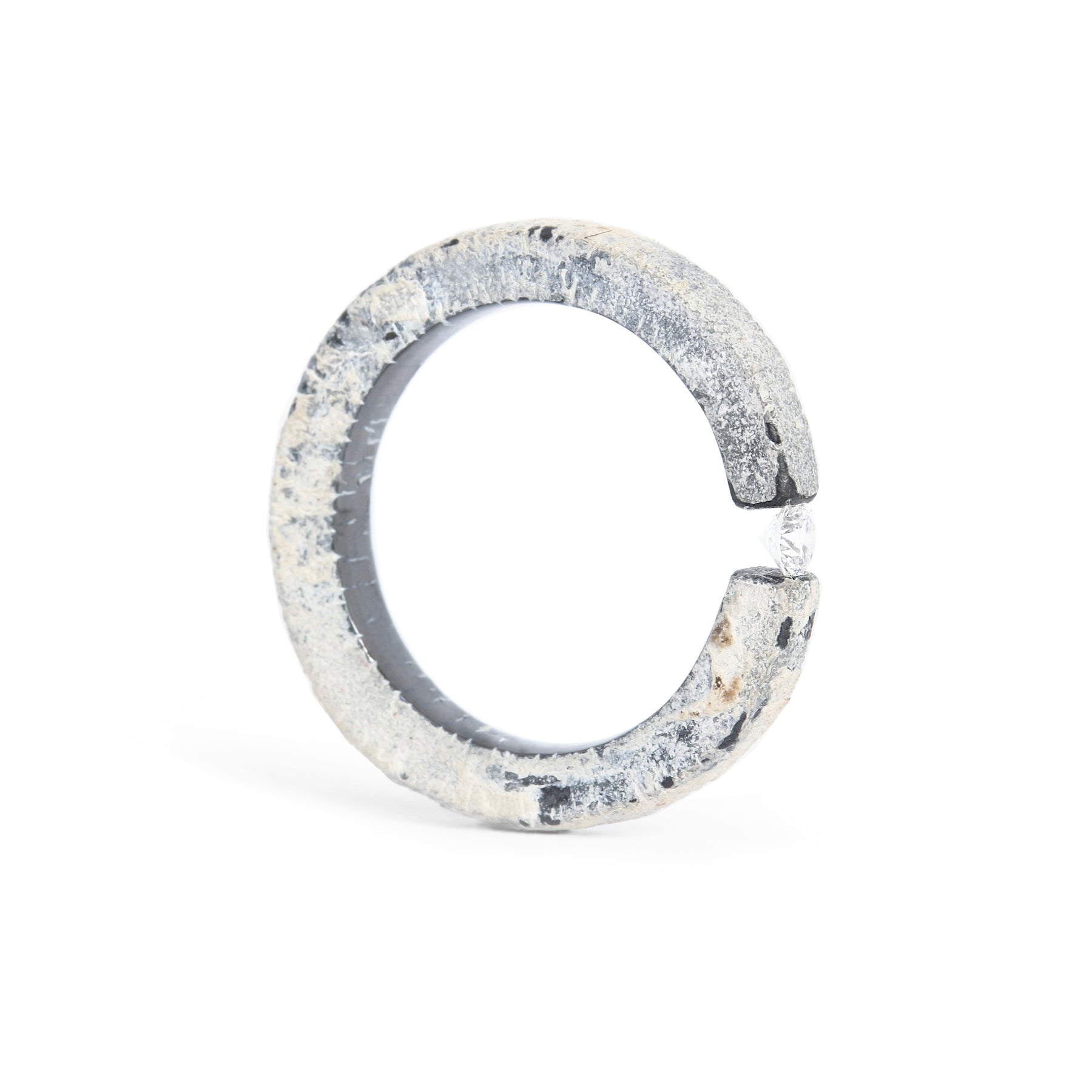 One-of-a-kind ring composed of tantalum and a white diamond by ASR JWLS.