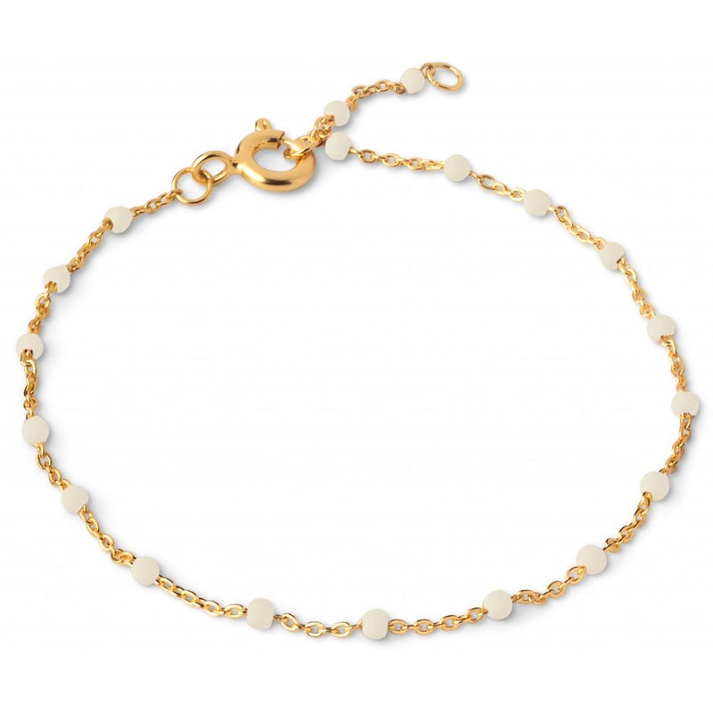 A gold-plated silver bracelet with small white enamel beads, featuring a gold-plated chain and a lobster clasp closure.