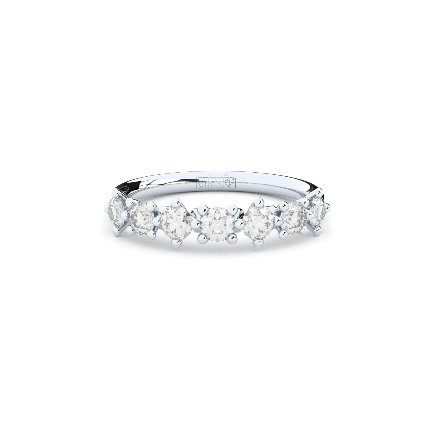 Unique half eternity band handcrafted in white gold. Set with the finest quality laboratory made diamonds.