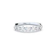 Unique half eternity band handcrafted in white gold. Set with the finest quality laboratory made diamonds.