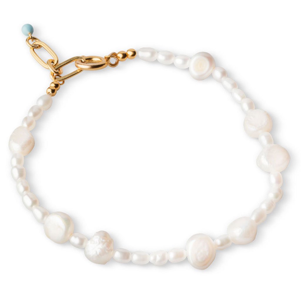 An 18K gold plated bracelet featuring freshwater pearls, with a gold-plated clasp.