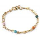 A gold-plated silver bracelet with adjustable chain and small enamel balls in pink, blue, orange, and green colors.