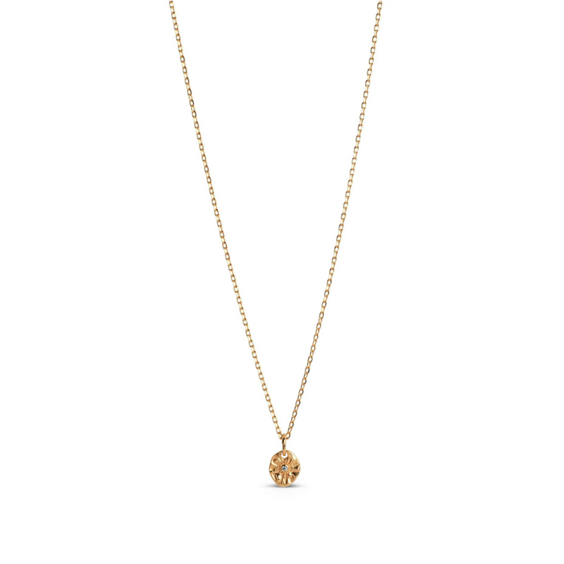 A gold-plated silver necklace with a small, gold-colored pendant featuring a cubic zirconia stone, displayed against a white background.