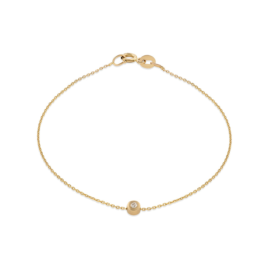 A 14k yellow gold bracelet with a white diamond accent, featuring a simple chain design.