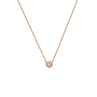 A rose gold choker necklace with a single white diamond pendant on a white background.